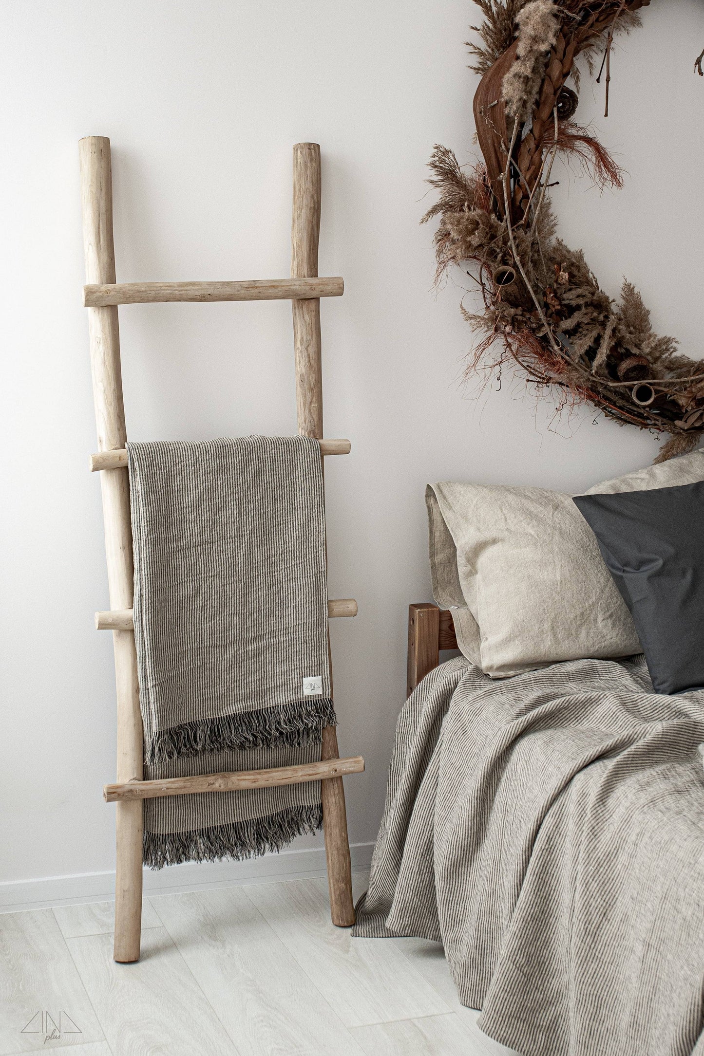Striped Medium Weight Linen Throw with fringes in Black and Natural ticking stripes.
