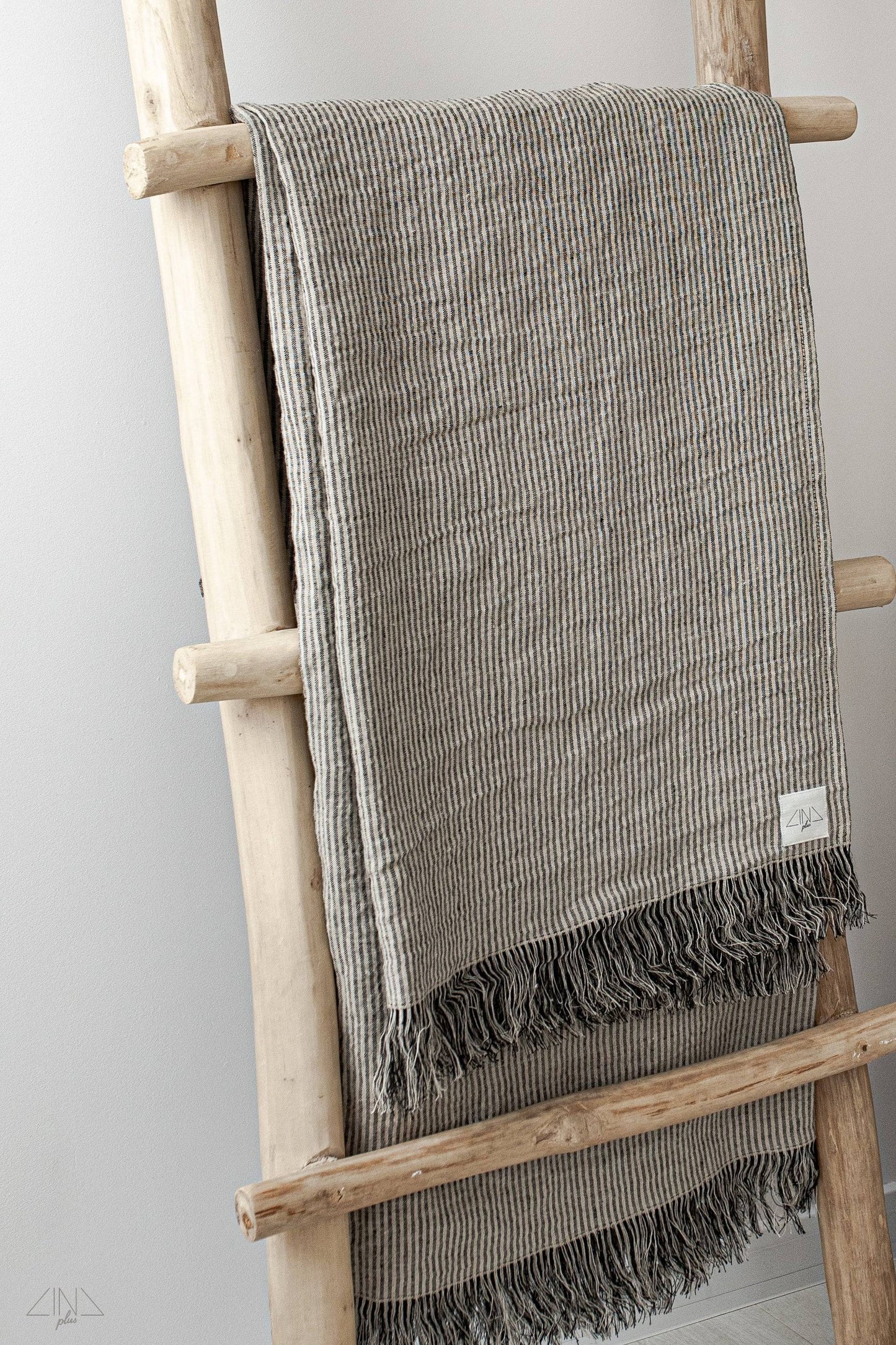 Striped Medium Weight Linen Throw with fringes in Black and Natural ticking stripes.