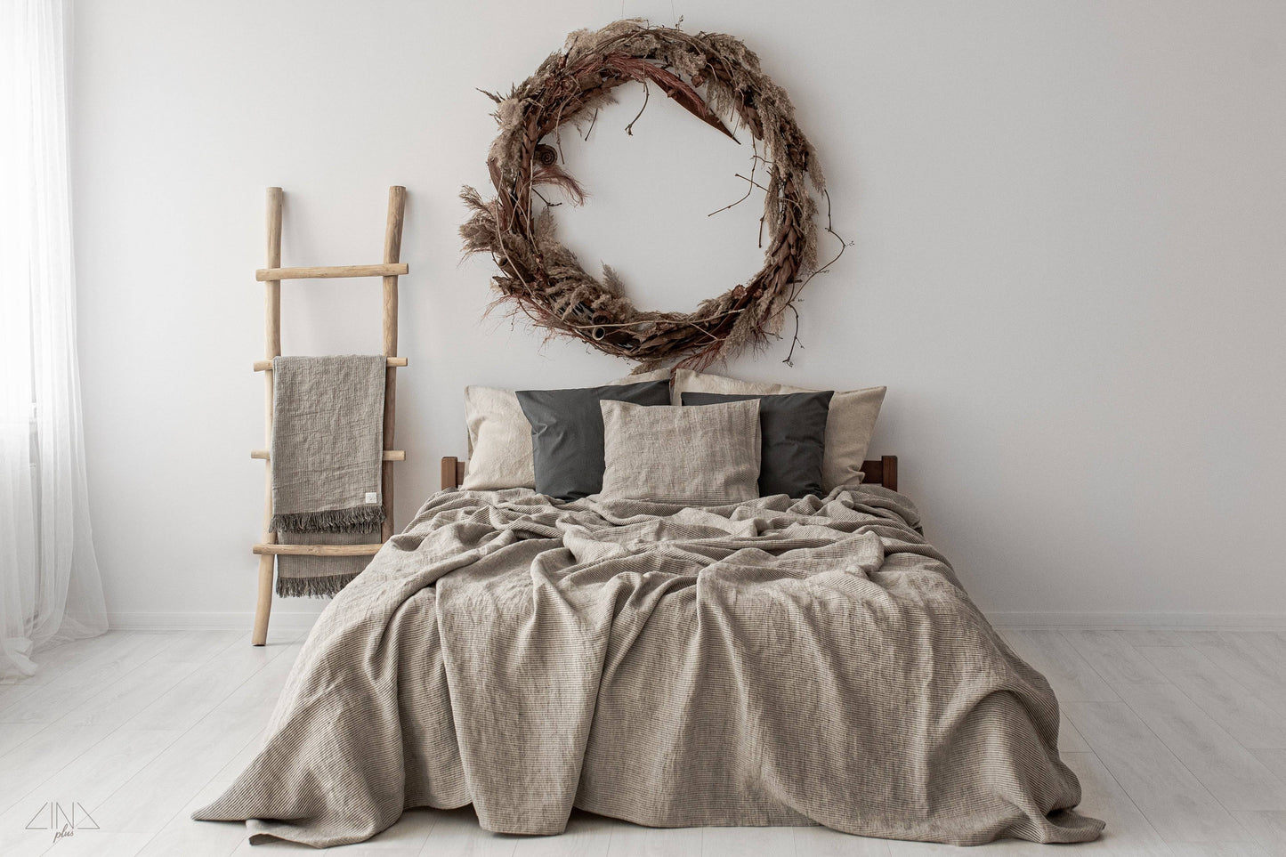 Striped Medium Weight Linen Throw with fringes in Black and Natural ticking stripes.