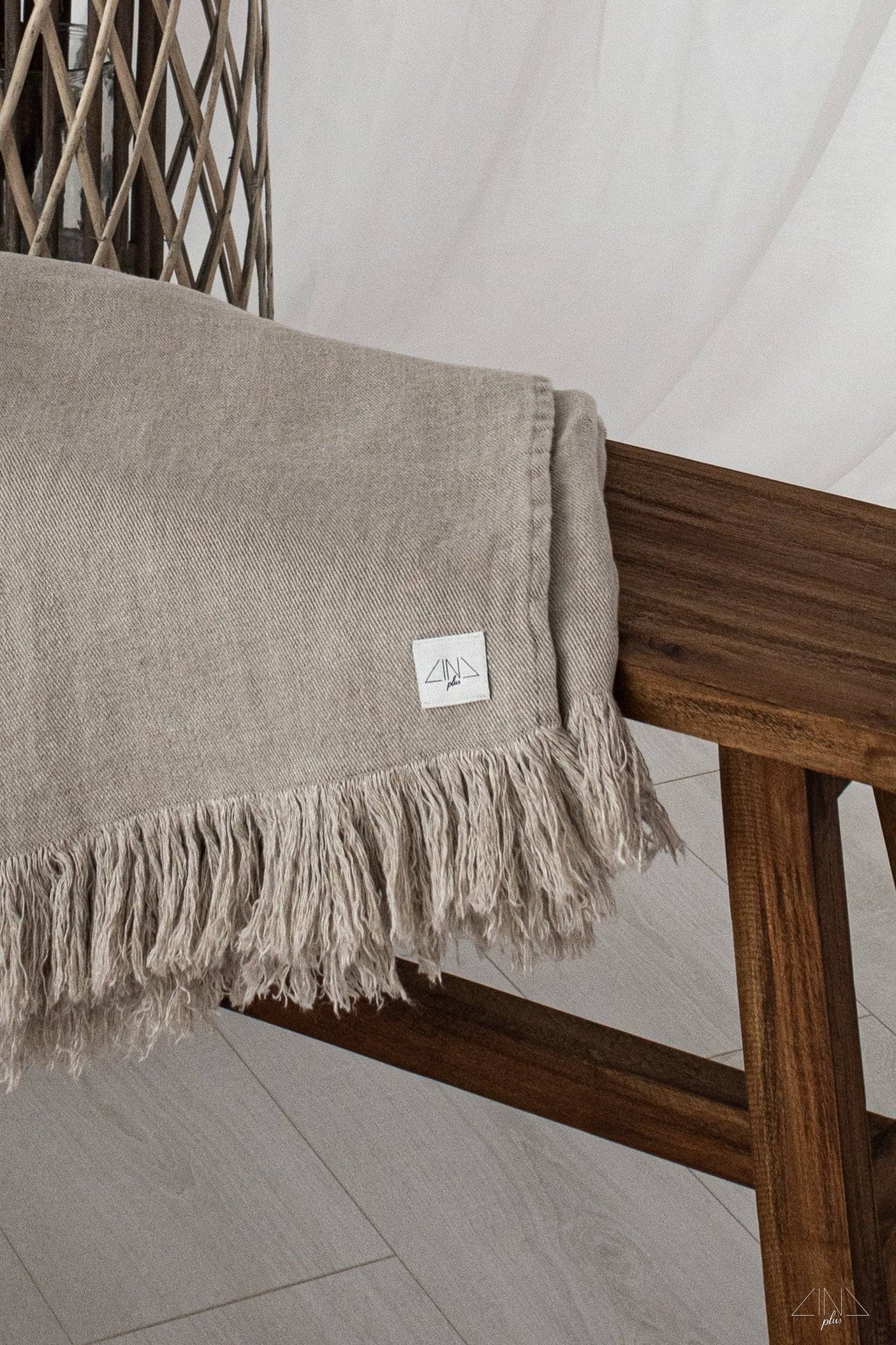 Heavy Weight Twill Linen Throw with fringes in natural flax color.