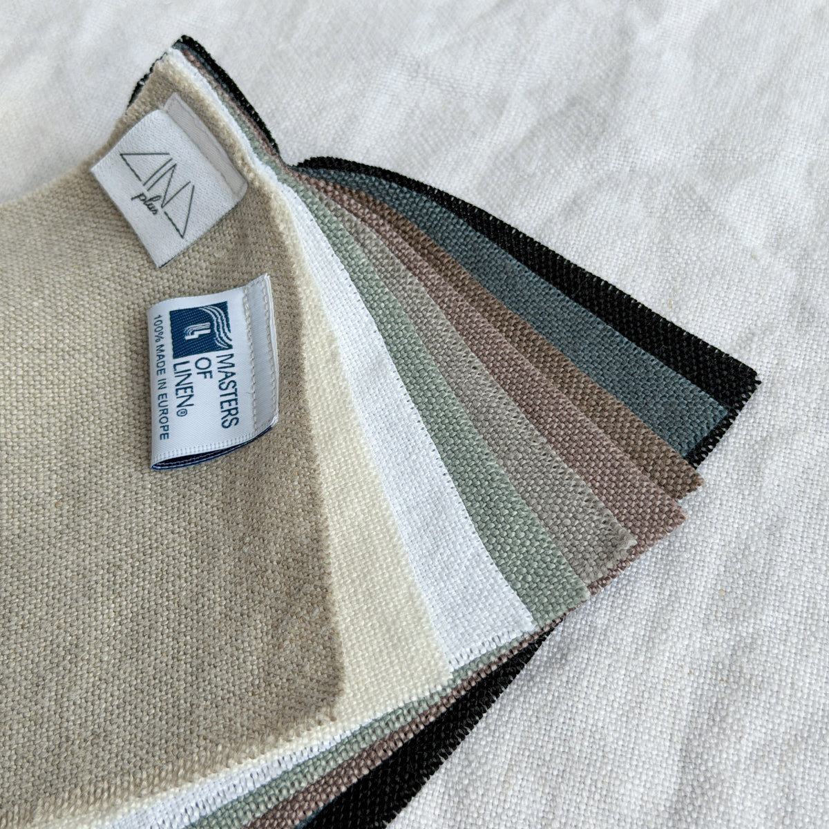 Linen samples CANAPO fanned display showing multiple color swatches with tags