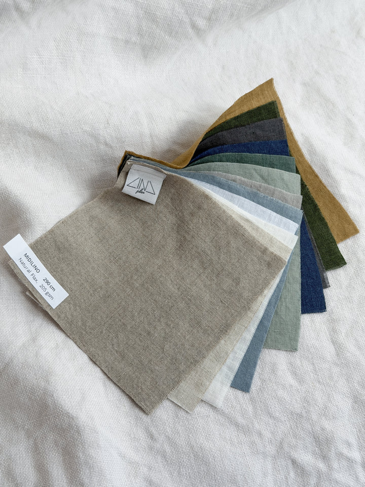 Linen Samples MIDILINO color swatch fan showing multiple fabric options in neutral and jewel tones