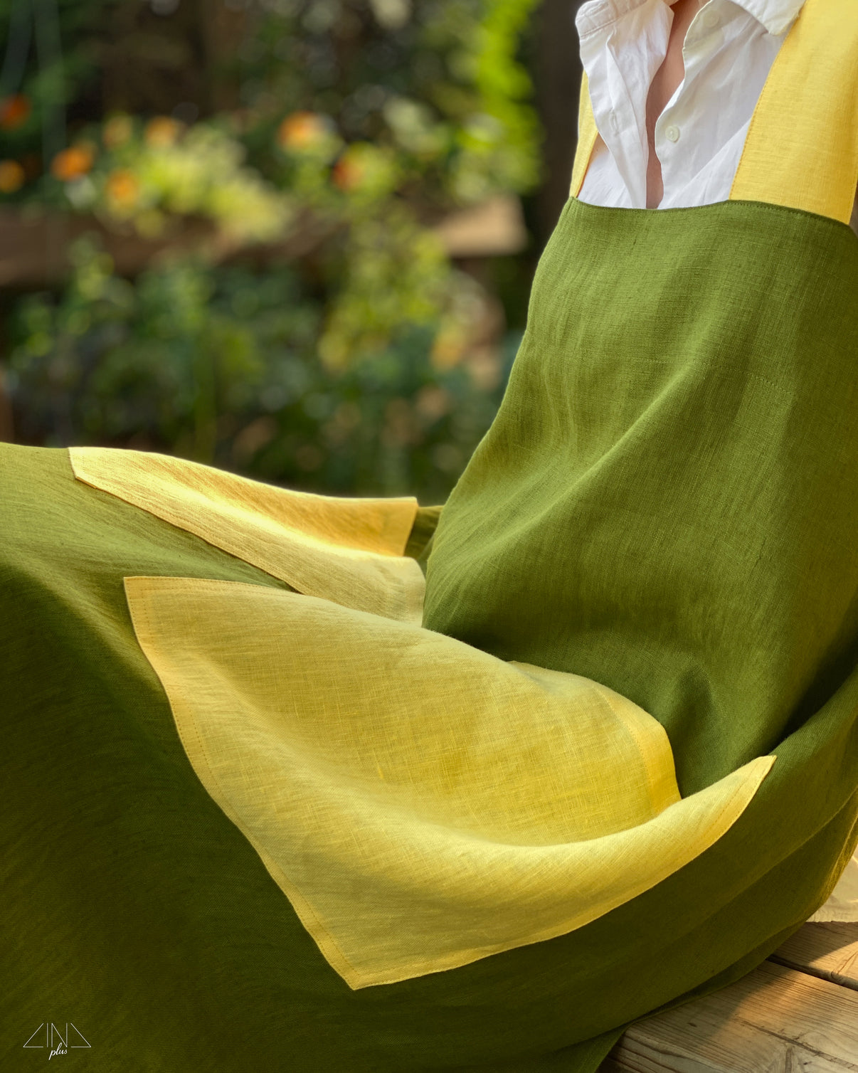 Bicolor Linen Pinafore Apron in Moss Green with Yellow Pockets and Straps for gardening